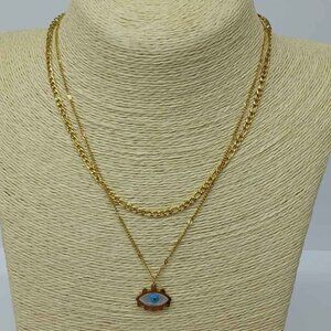 Stainless steel necklace with pendant , New with tags , gold , white and blue